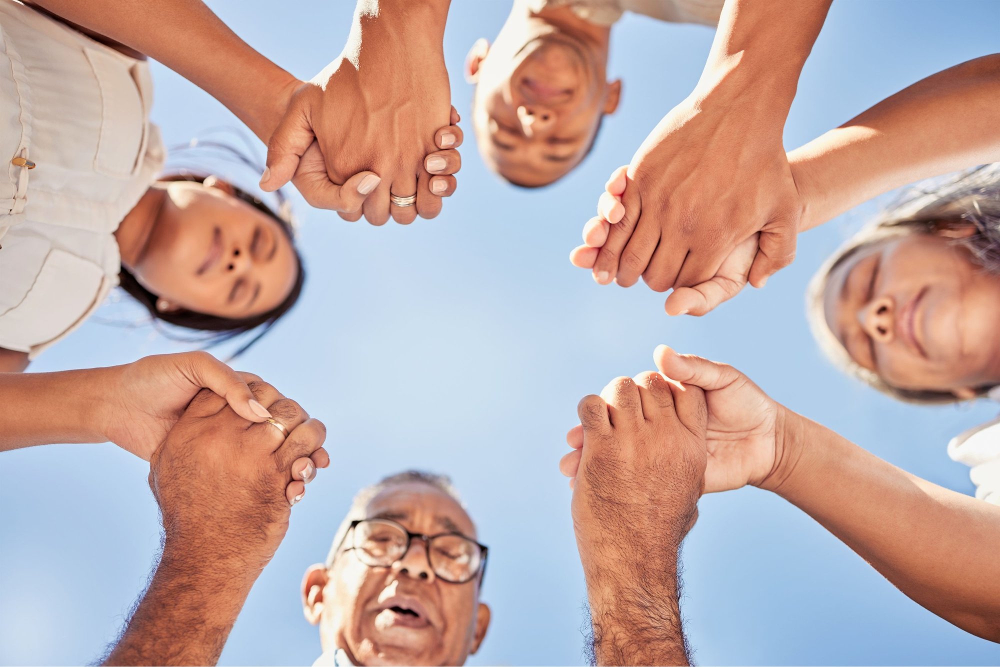 worship-prayer-and-family-holding-hands-praying