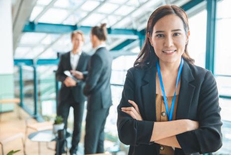 stock-photo-image-of-young-beautiful-joyful-woman-smiling-while-working-with-laptop-in-office-1786572482
